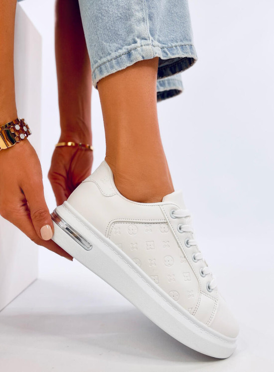 Weiße Sneaker mit Reliefmuster