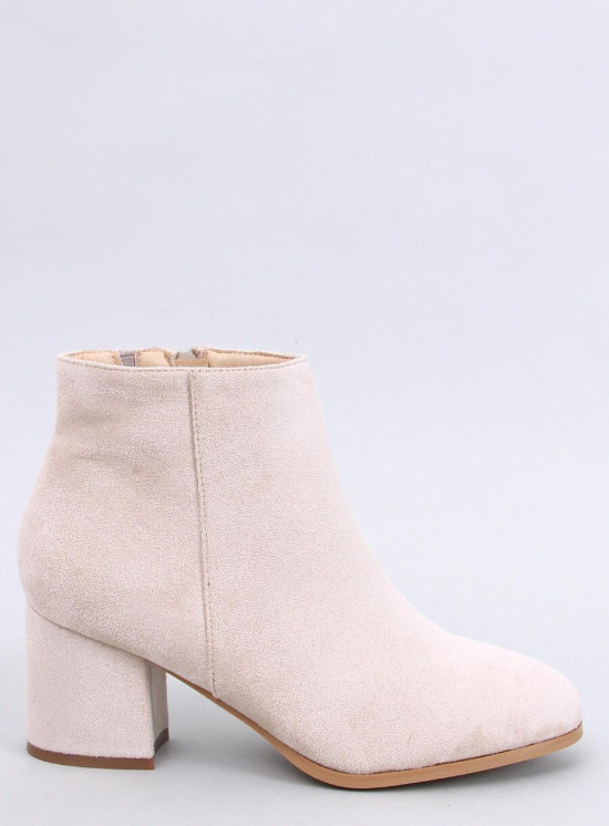 Cremeweiße Stiefeletten mit Absatz