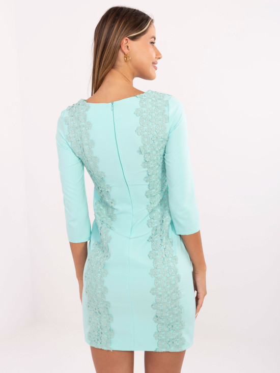 Mintgrünes Cocktailkleid mit Blumenapplikation