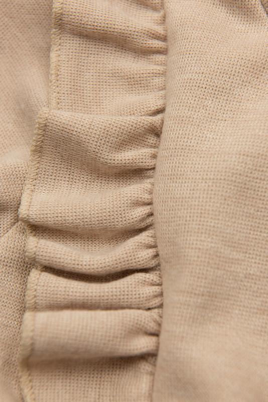 Mädchenkleid mit Faltenrock aus Kunstleder Beige