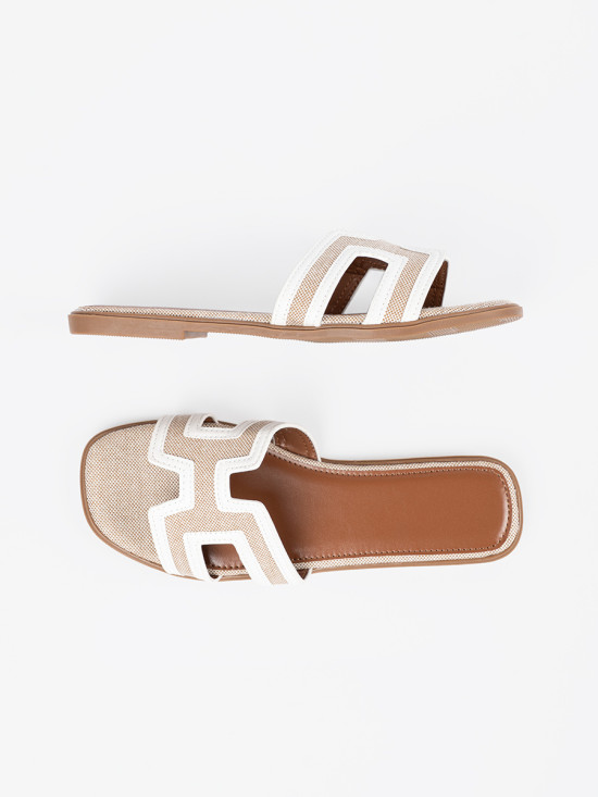 Weiße Slipper mit flachem Absatz