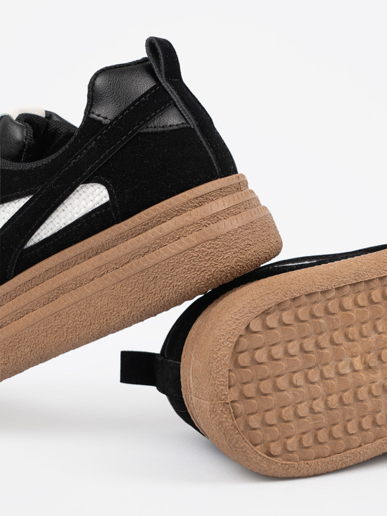 Schwarze Damen Sneakers mit weißen Akzenten