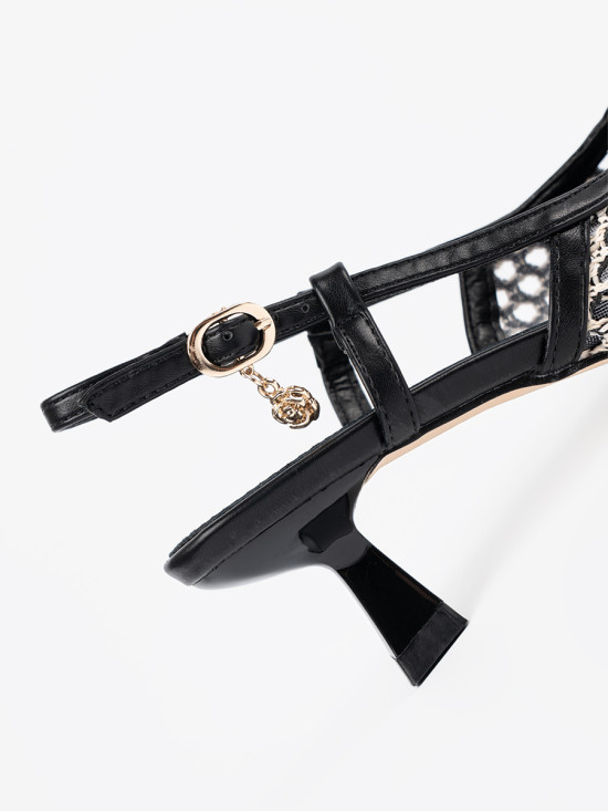 Schwarze Ajour-Pumps mit niedrigem Absatz