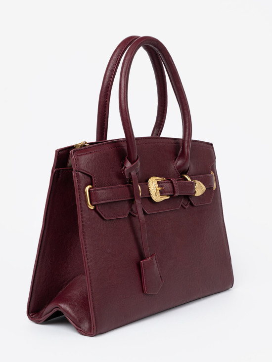 Bordeauxfarbene Handtasche mit dekorativer goldener Schnalle