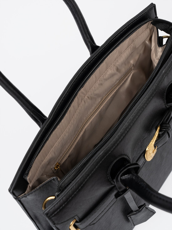 Schwarze Handtasche mit dekorativer goldener Schnalle