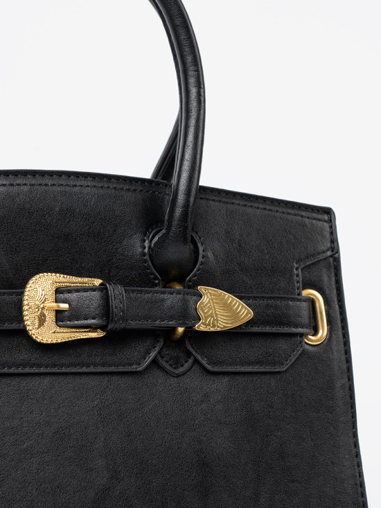 Schwarze Handtasche mit dekorativer goldener Schnalle