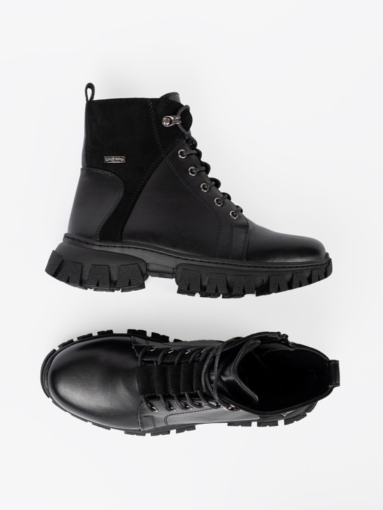 Schwarze Stiefeletten mit massiver Sohle und Reißverschluss