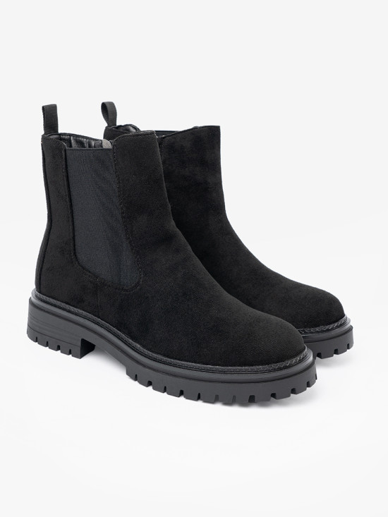 Klassische schwarze Stiefeletten mit dicker Sohle