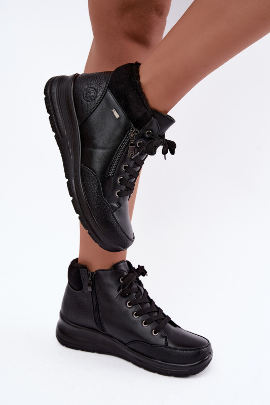 Schwarze Keilabsatz-Stiefelette mit Fellfutter