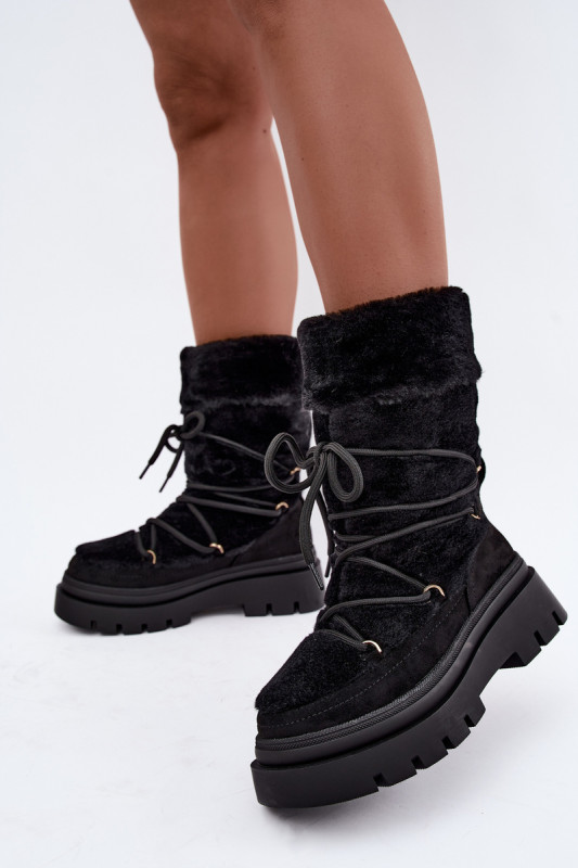 Schwarze Schneestiefel mit Fellbesatz und Plateausohle