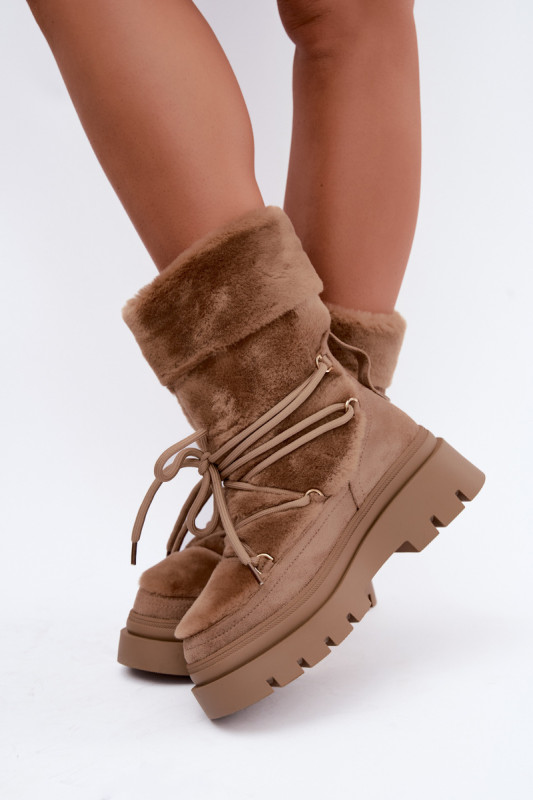 Beige Schneestiefel mit Fellbesatz auf Plateausohle