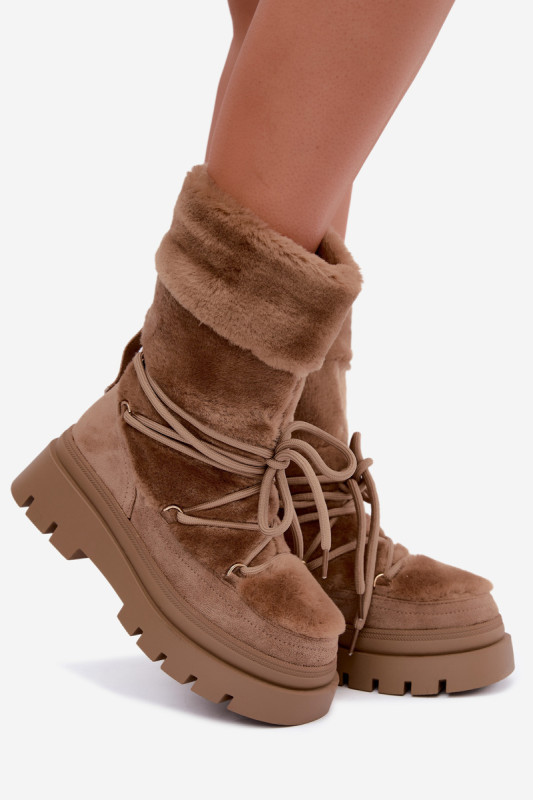 Beige Schneestiefel mit Fellbesatz auf Plateausohle