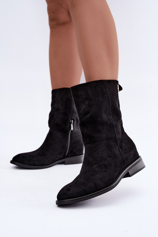 Gefütterte schwarze Stiefelette mit flachem Absatz aus Wildlederoptik