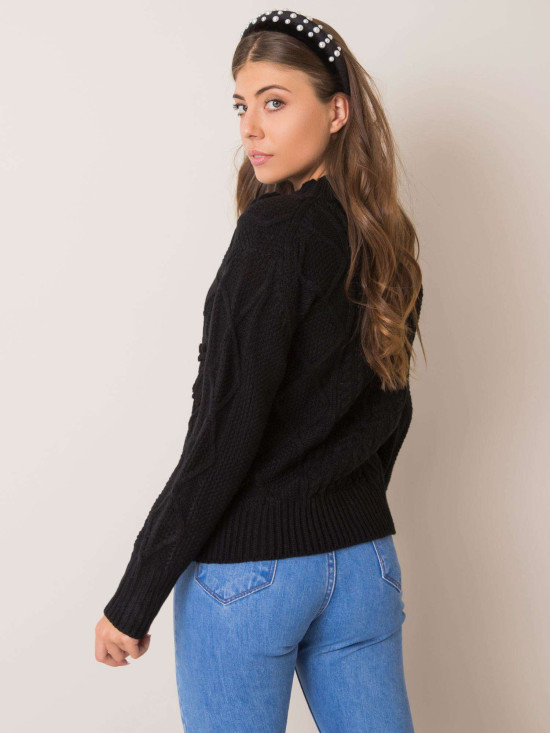 Schwarzer Pullover mit Zöpfen