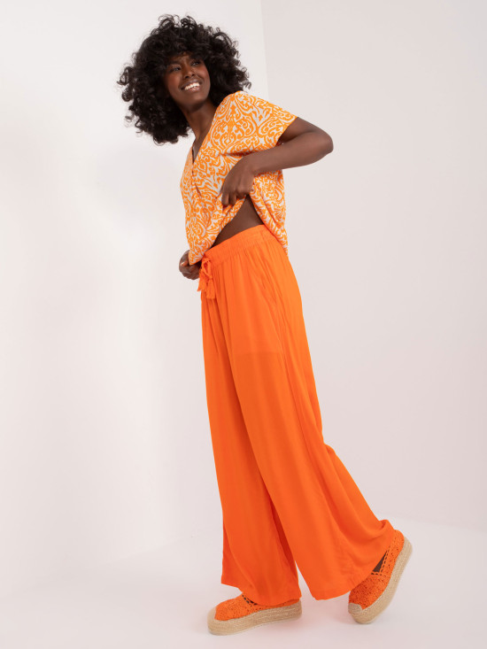 Stylische orange Palazzo-Hosen