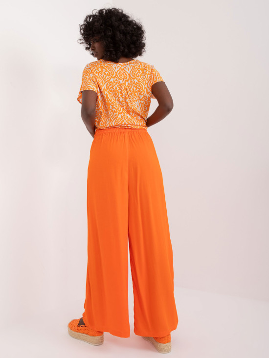 Stylische orange Palazzo-Hosen