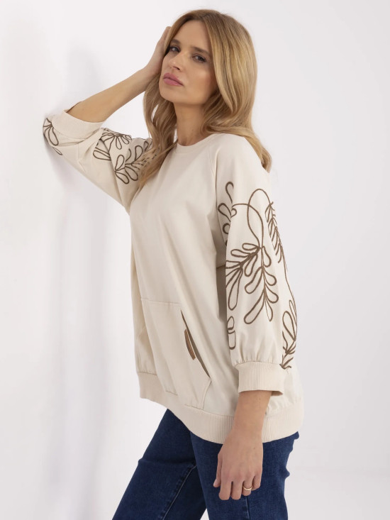 Elegante Bluse mit Stickerei in hellem Beige