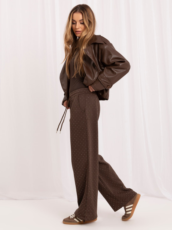 Braune weite Sweatpants mit Applikation