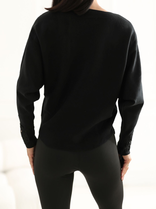 Eleganter schwarzer Pullover mit Spitze