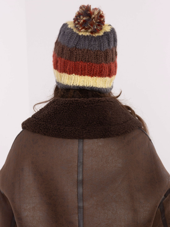 Gelbe gestreifte Mütze mit Pompon