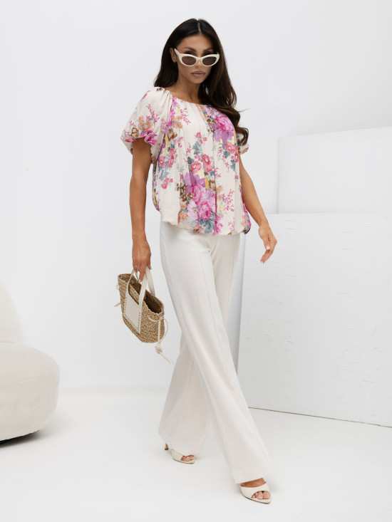 Rosa Bluse mit Blumenmuster und Puffärmeln