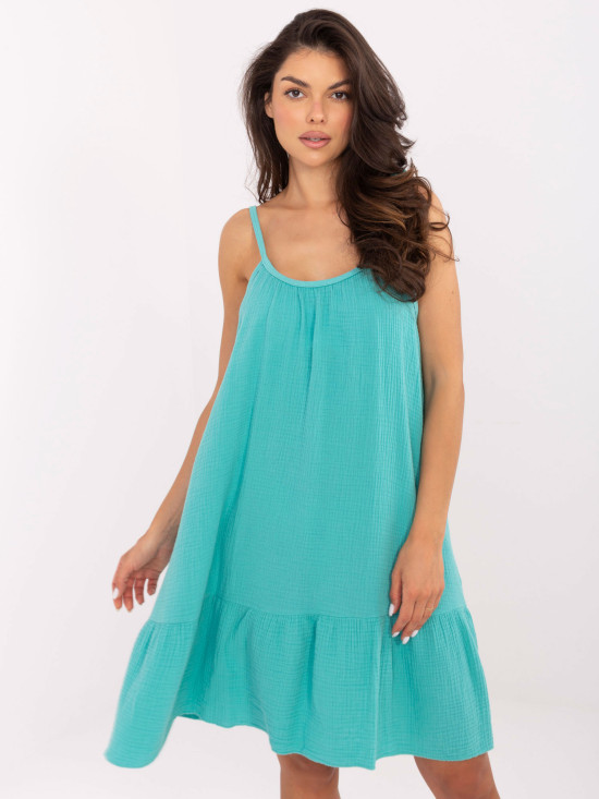 Türkisfarbene ausgestellte Kleider