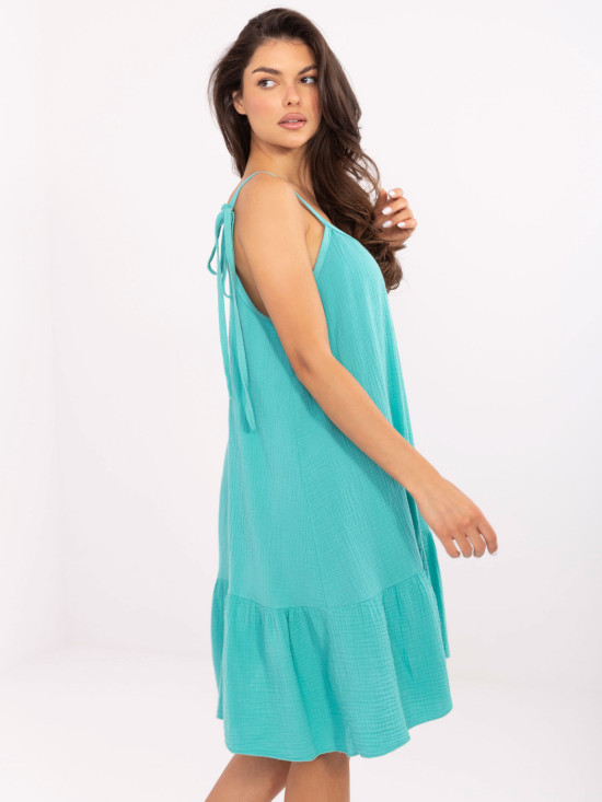 Türkisfarbene ausgestellte Kleider