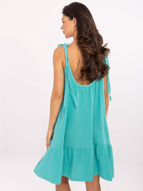 Türkisfarbene ausgestellte Kleider