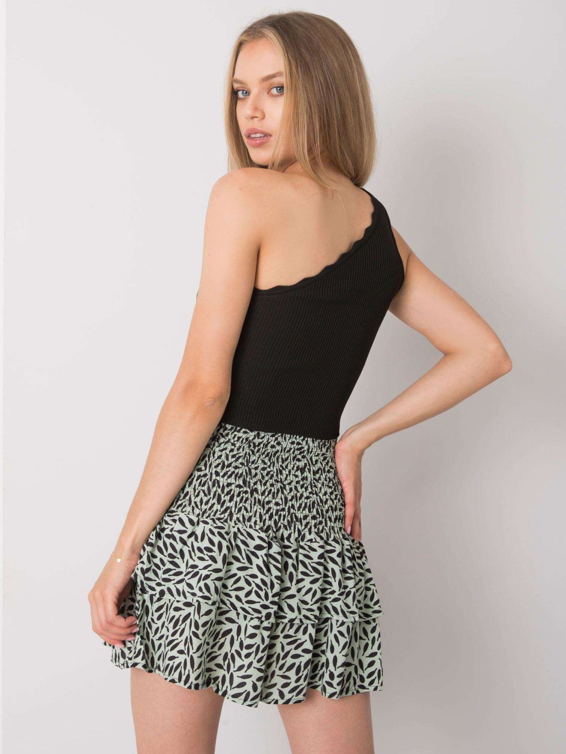 Grün-schwarzer Rock mit Volant von RUE PARIS