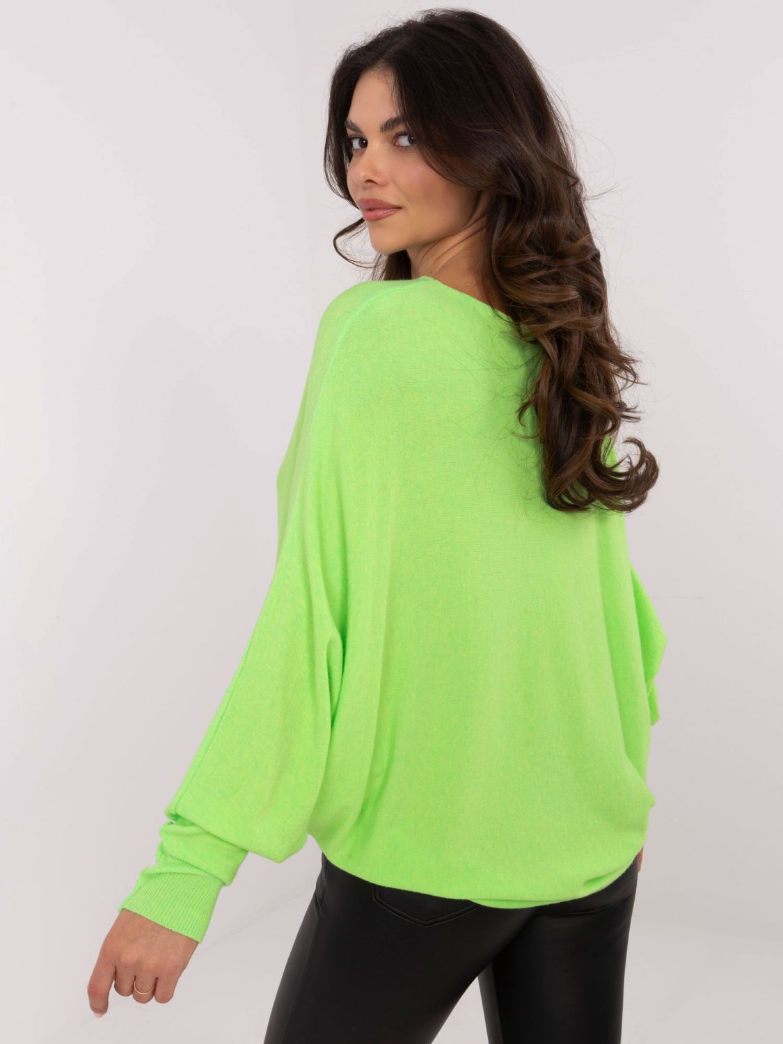 Fluoreszierender grüner Pullover