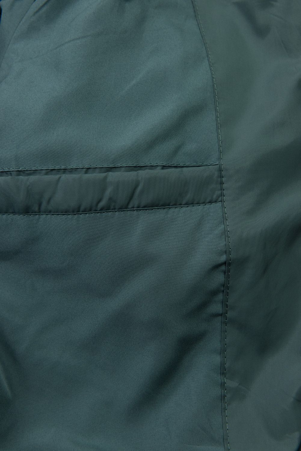 Verlängerter Damen-Wintermantel Petrolgrün