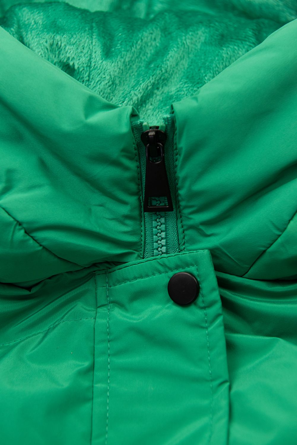 Lange Steppweste mit Kapuze Smaragdgrün