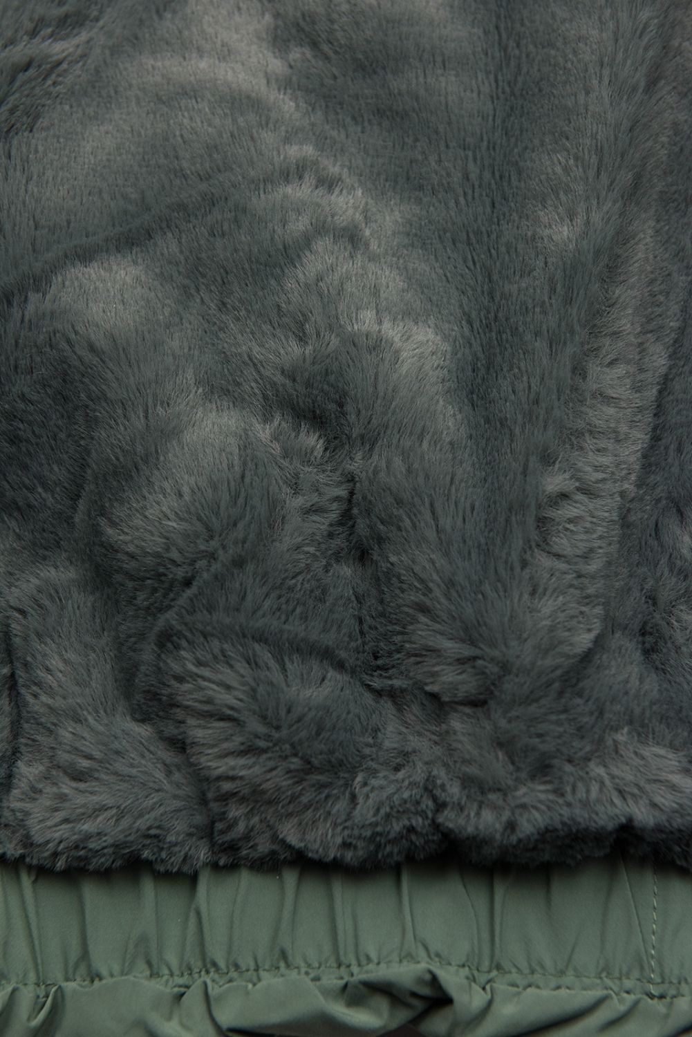 Warme Winterjacke in verlängertem Schnitt Mintgrün