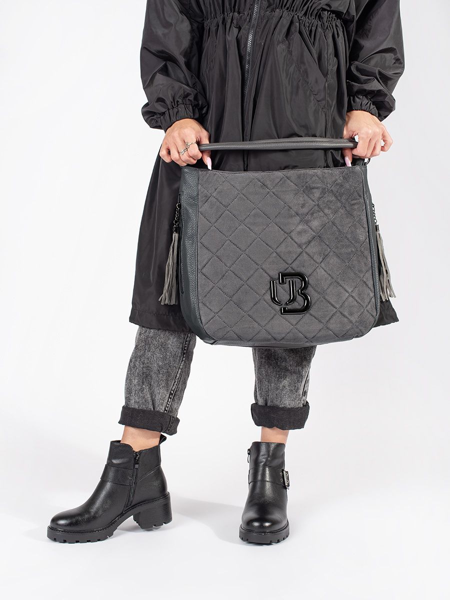 Schwarze Leder Stiefeletten mit Absatz und dekorativer Schnalle