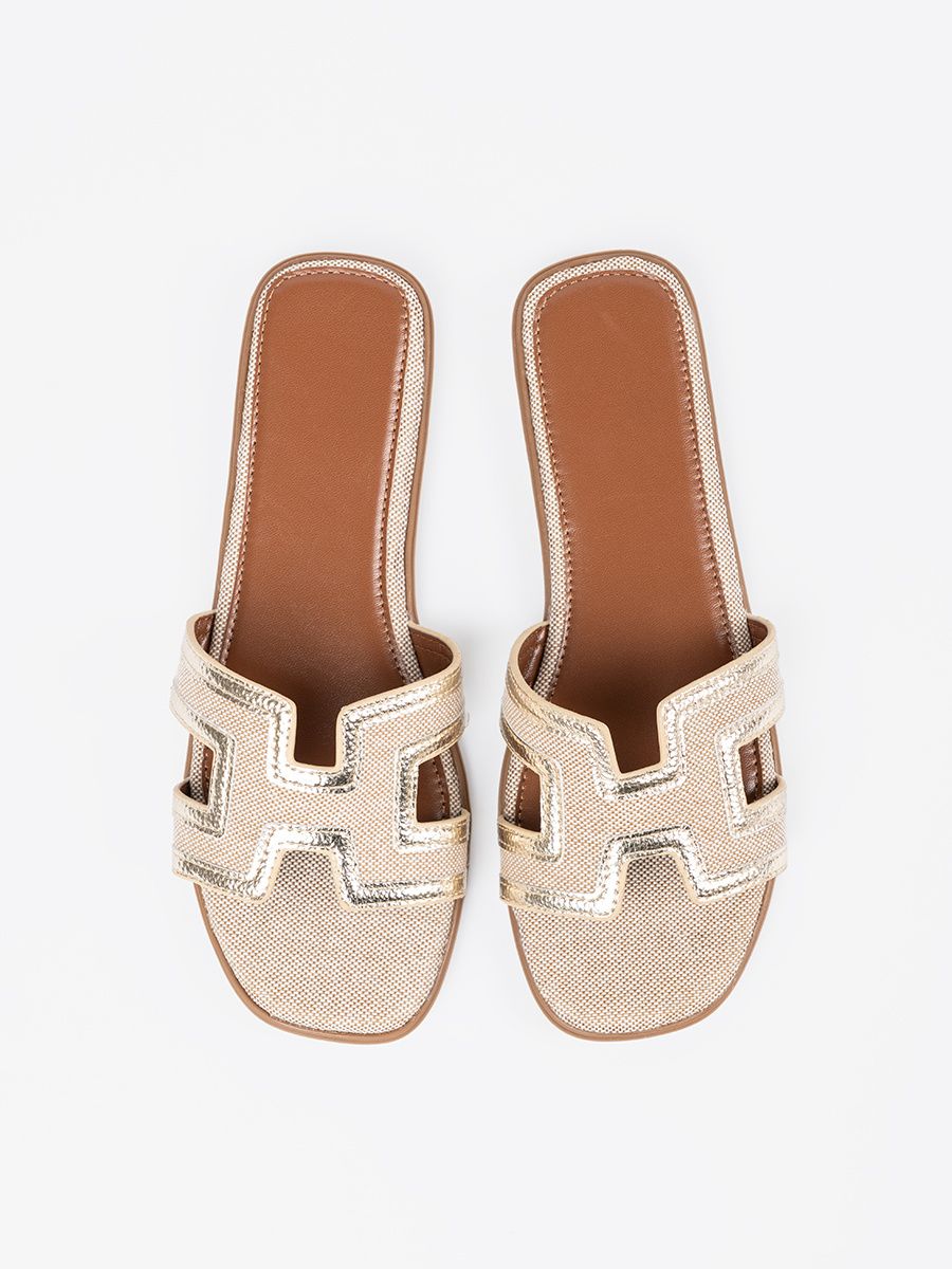 Goldene Slipper mit flachem Absatz