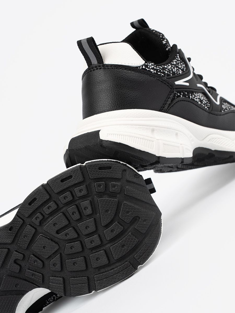 Schwarze Damen Sneakers mit dekorativen Einsätzen