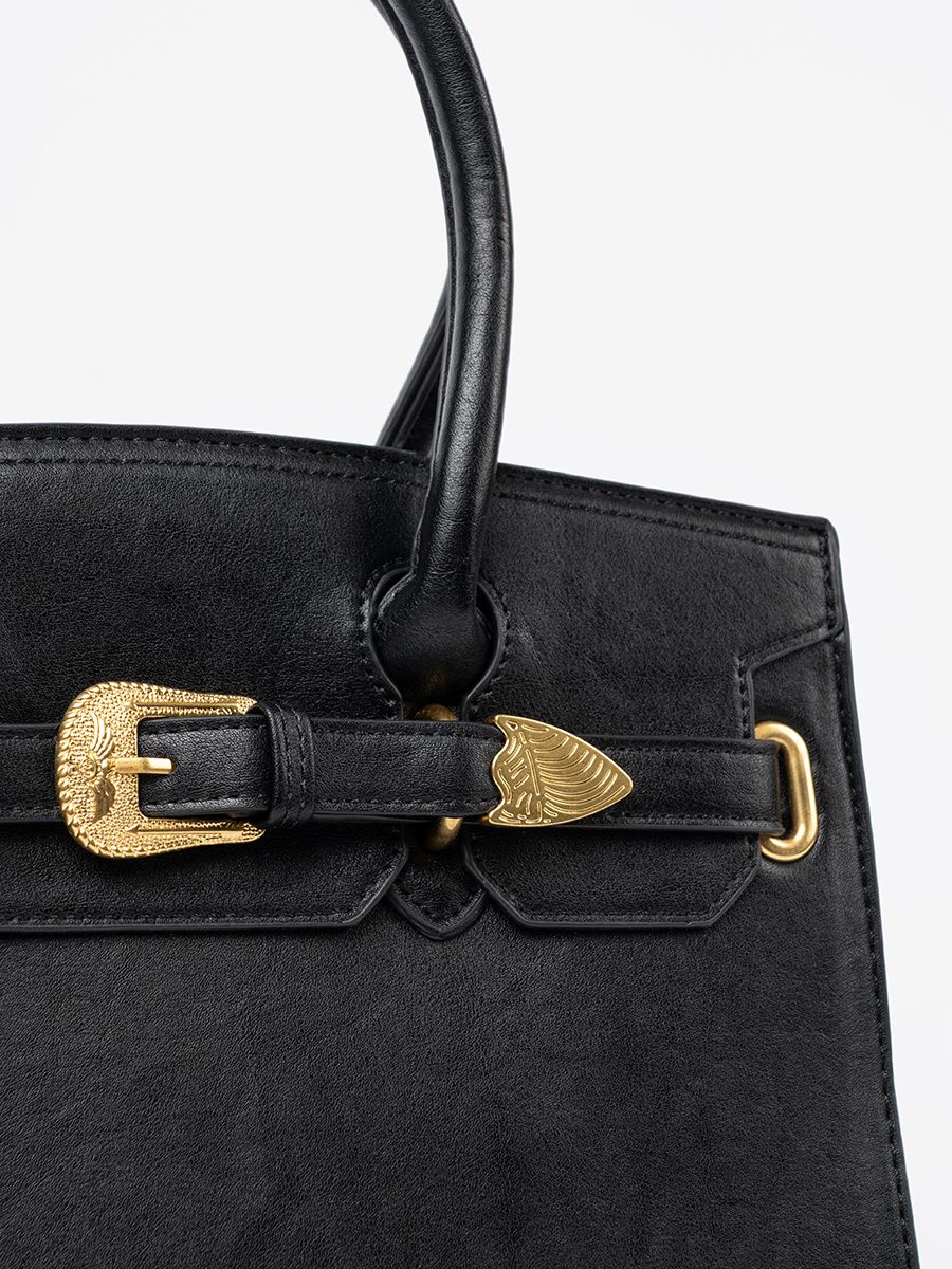 Schwarze Handtasche mit dekorativer goldener Schnalle