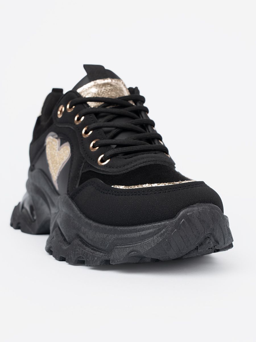 Schwarze Sneakers mit goldenem Herzen