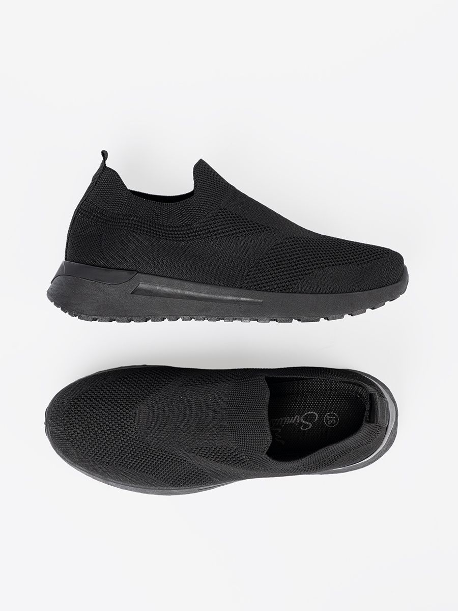 Schwarze Slip-On Sneakers