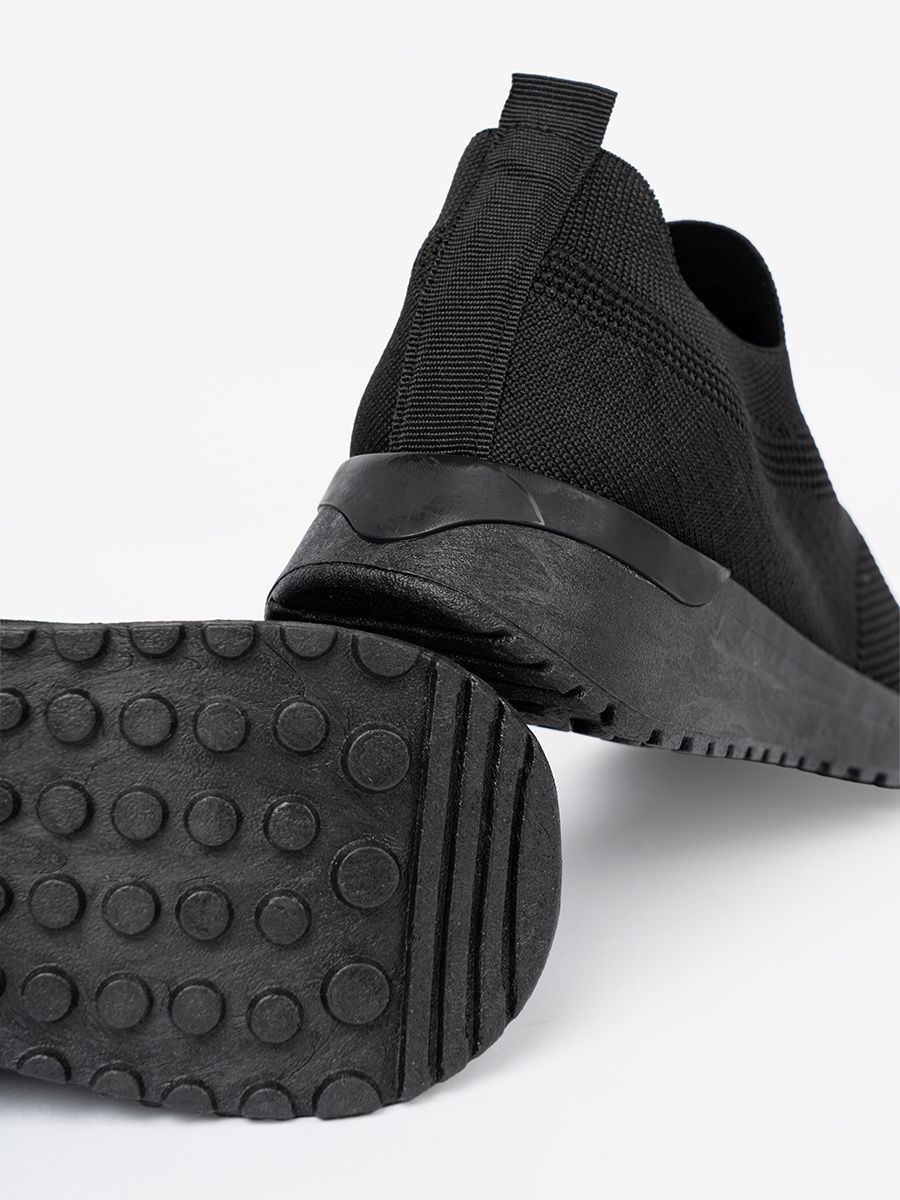 Schwarze Slip-On Sneakers