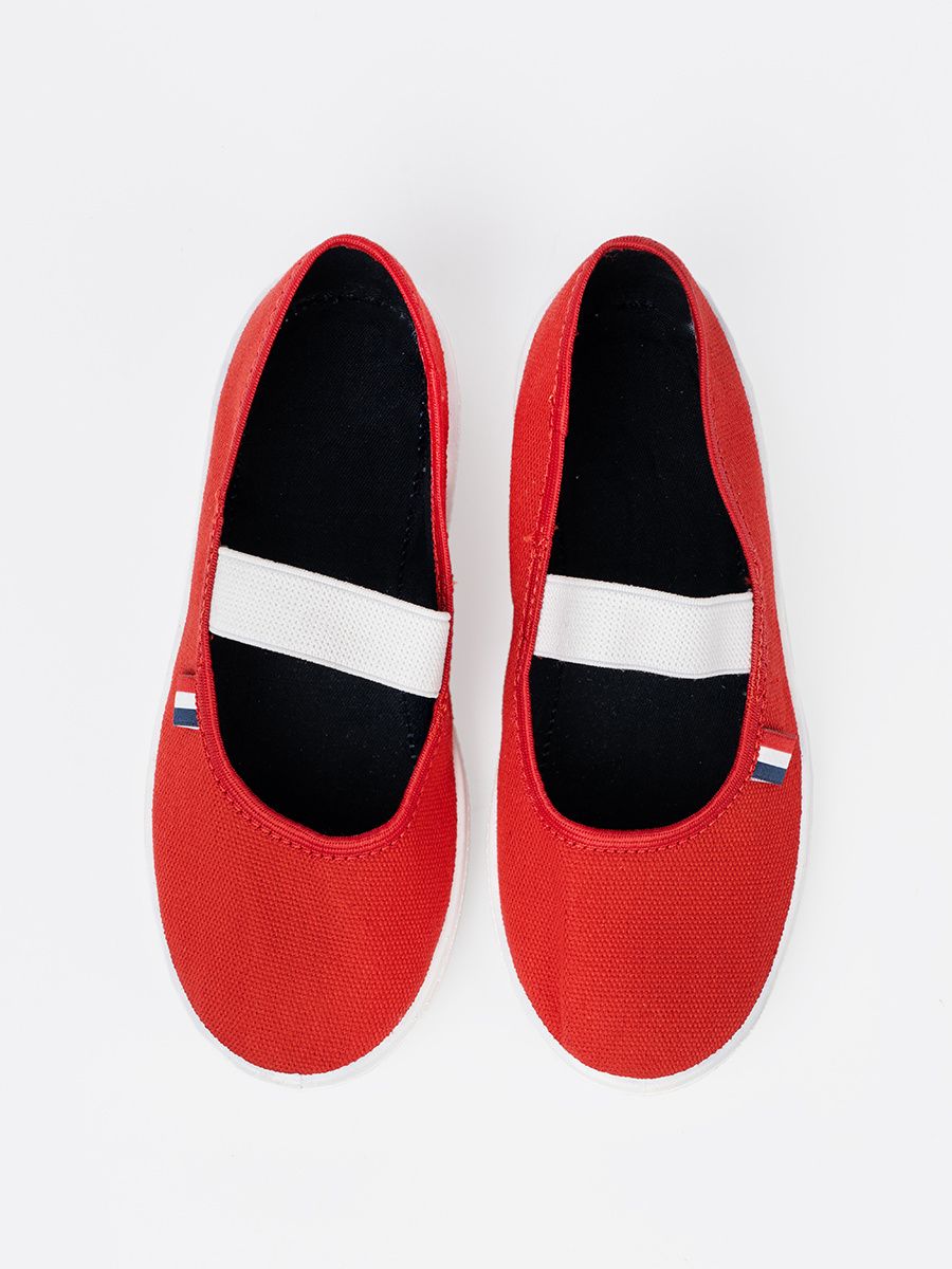 Leichte rote Sneakers mit elastischem Riemen