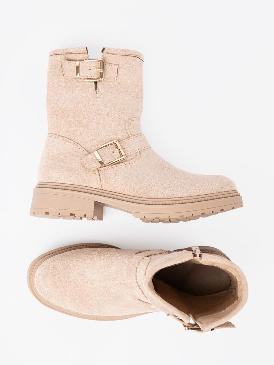 Stilvolle beige Stiefeletten mit dekorativen Schnallen