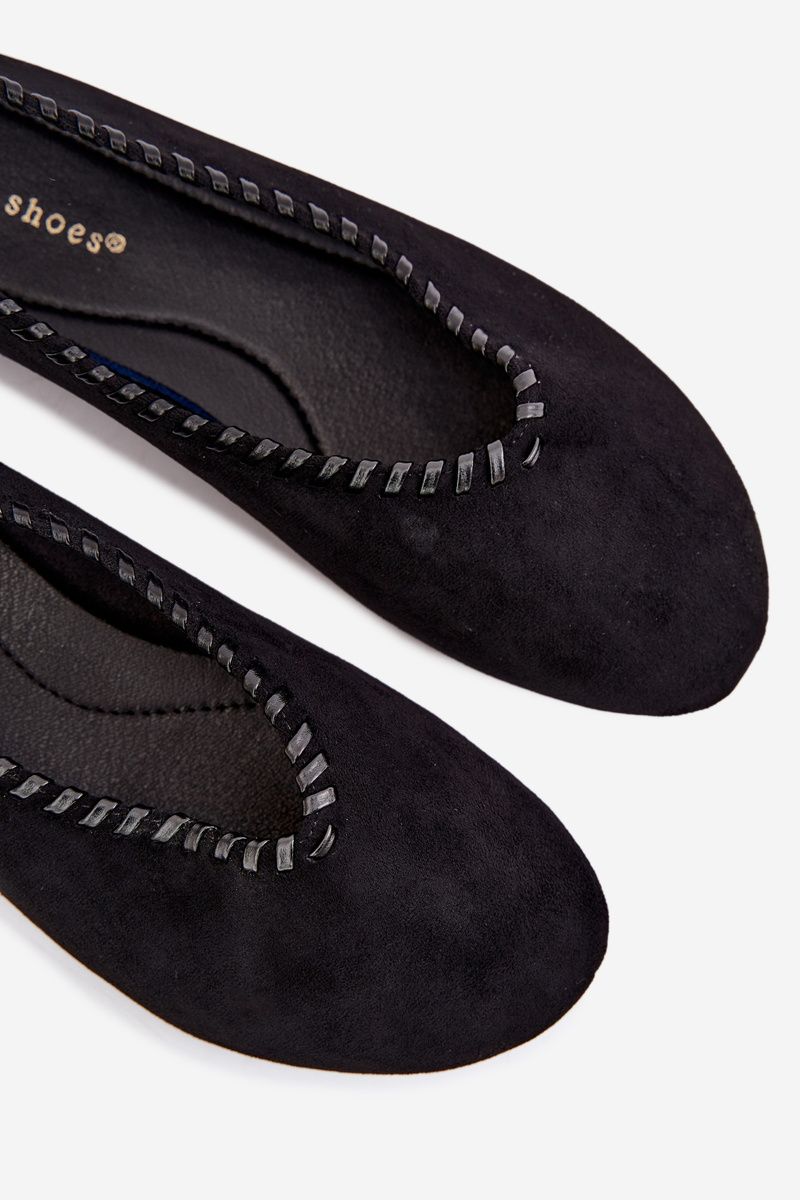 Schwarze Ballerinas mit geflochtenem Besatz