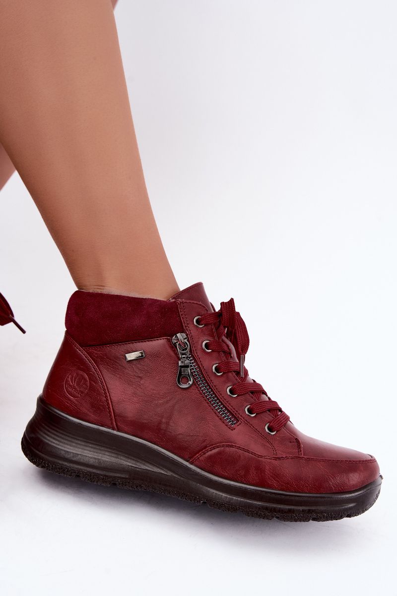Rote Ankle Boots aus Kunstleder mit Keilabsatz und Fellfutter