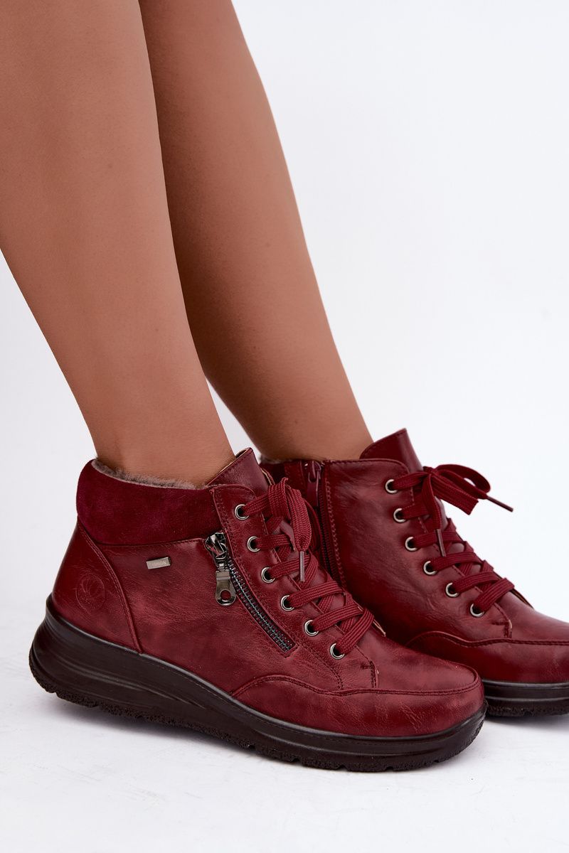 Rote Ankle Boots aus Kunstleder mit Keilabsatz und Fellfutter