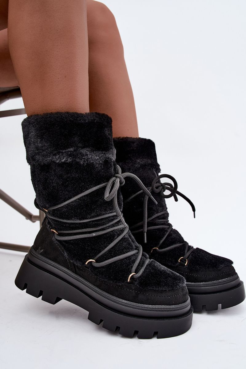 Schwarze Schneestiefel mit Fellbesatz und Plateausohle
