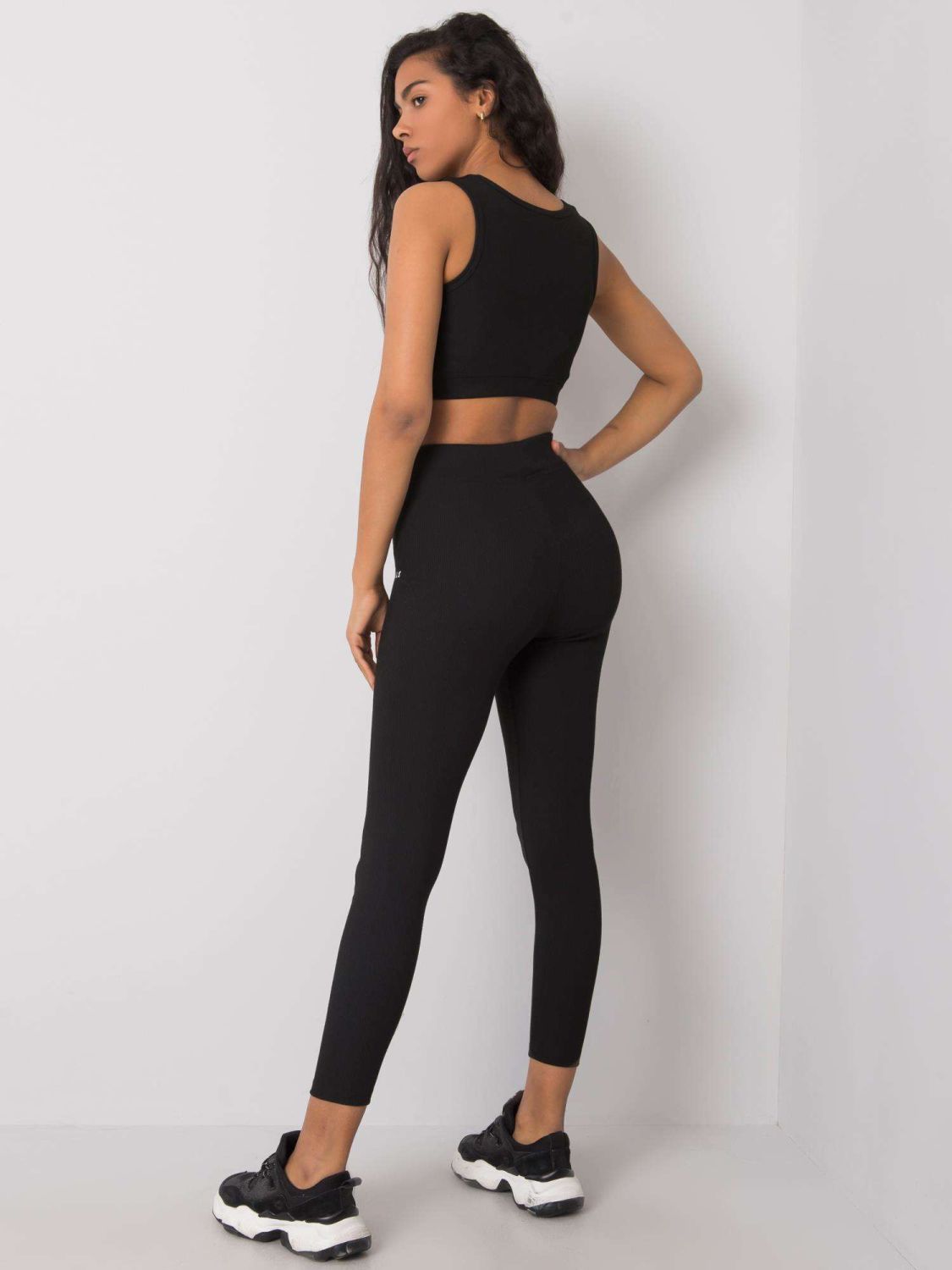 Schwarzes gestreiftes Sportset