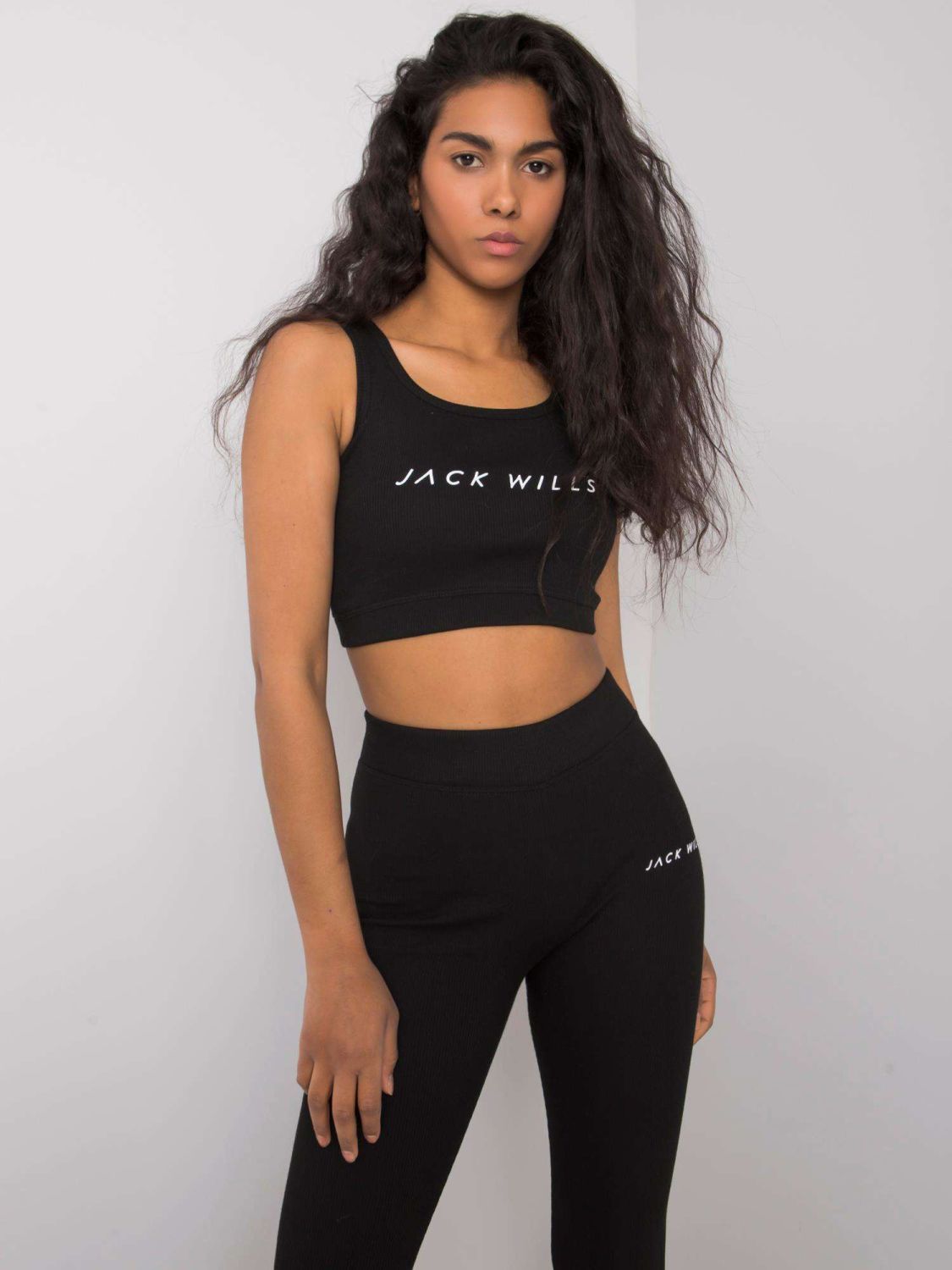 Schwarzes gestreiftes Sportset