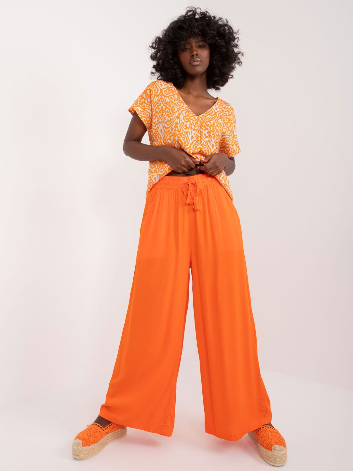 Stylische orange Palazzo-Hosen