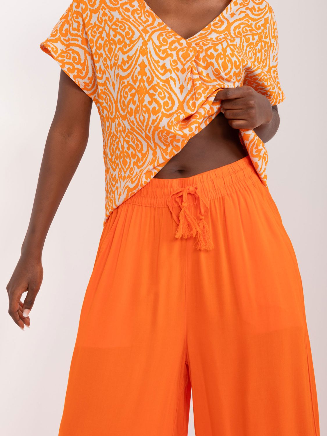 Stylische orange Palazzo-Hosen
